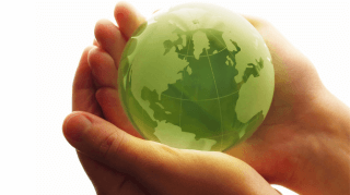 earth friendly globe in hands
